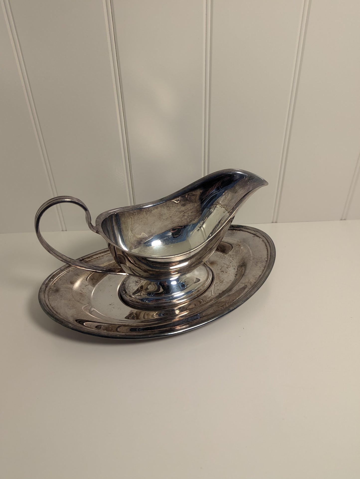 Silver plated gravy boat and plate