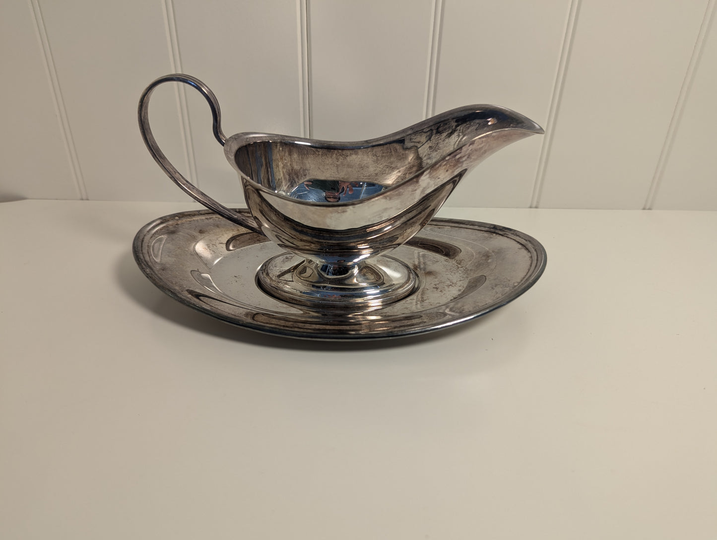 Silver plated gravy boat and plate